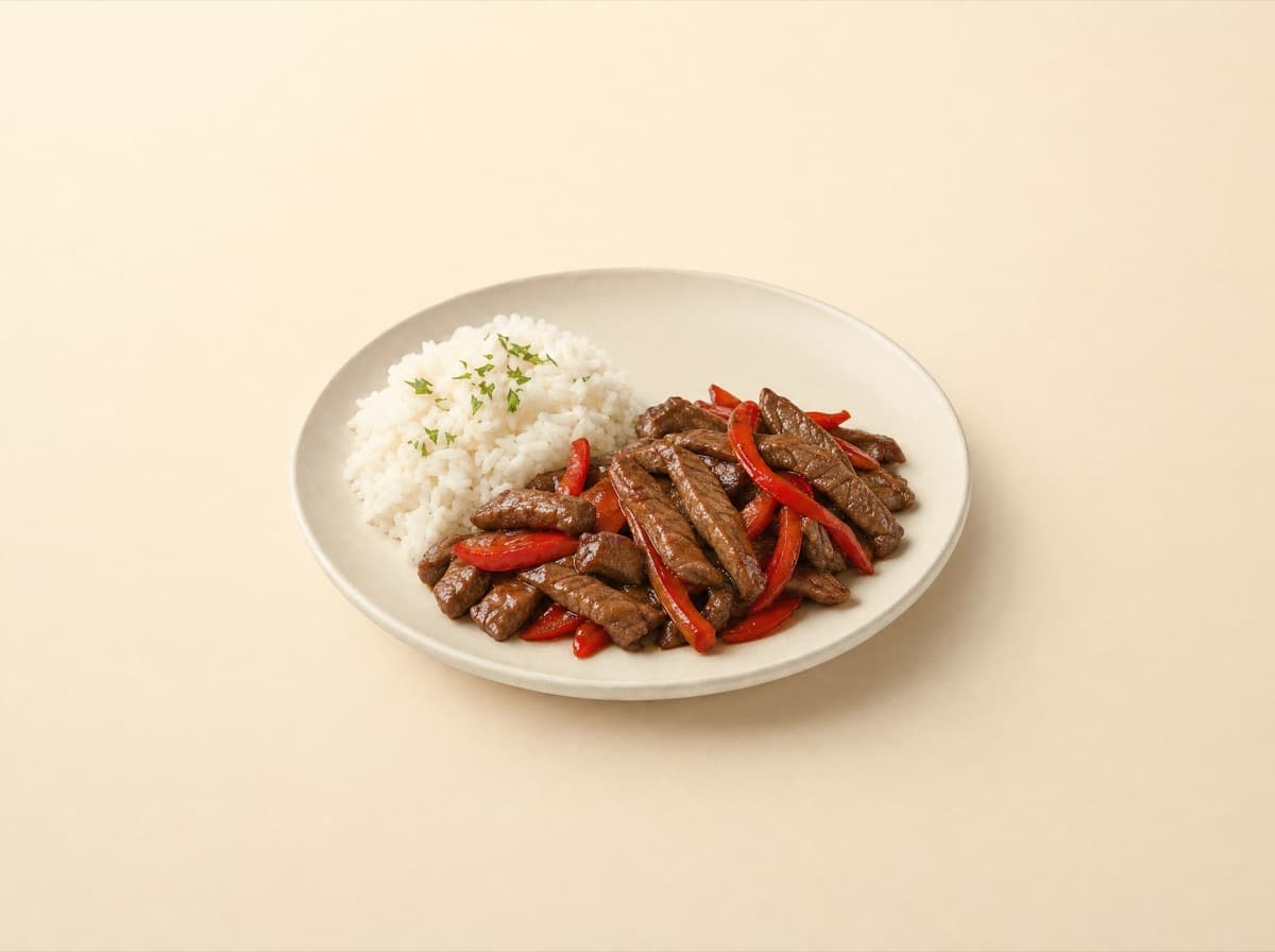 The plate: beef stir-fry with peppers and rice.