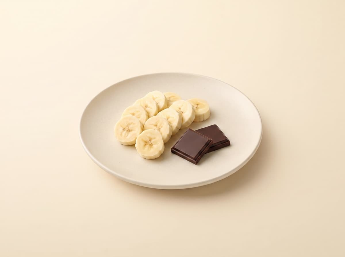The plate: banana with dark chocolate squares.
