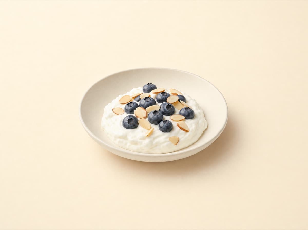 The plate: fromage blanc with almonds and blueberries.