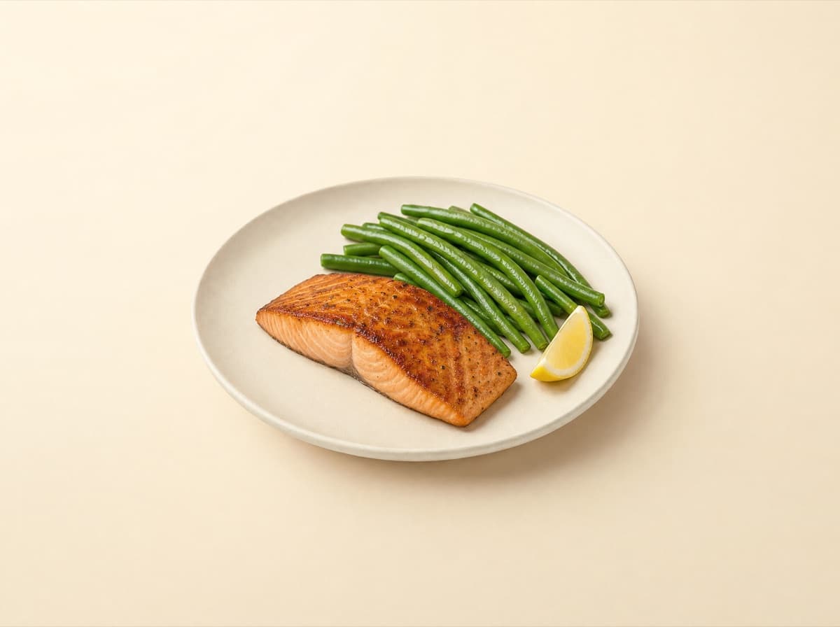 The plate: roasted salmon with green beans and lemon.