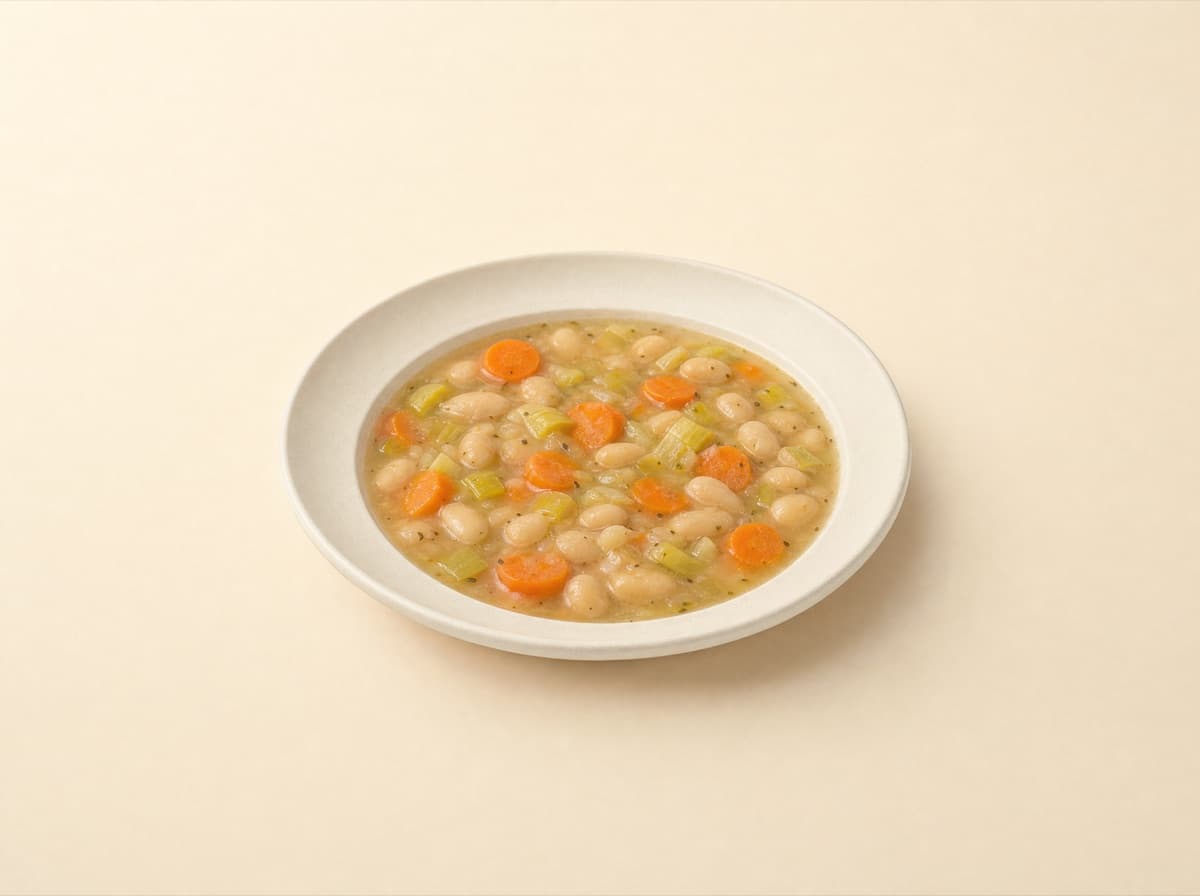 The plate: white bean soup with carrot and leek.