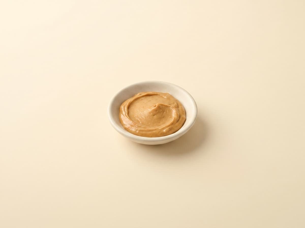 Peanut butter, as this page weighs it.